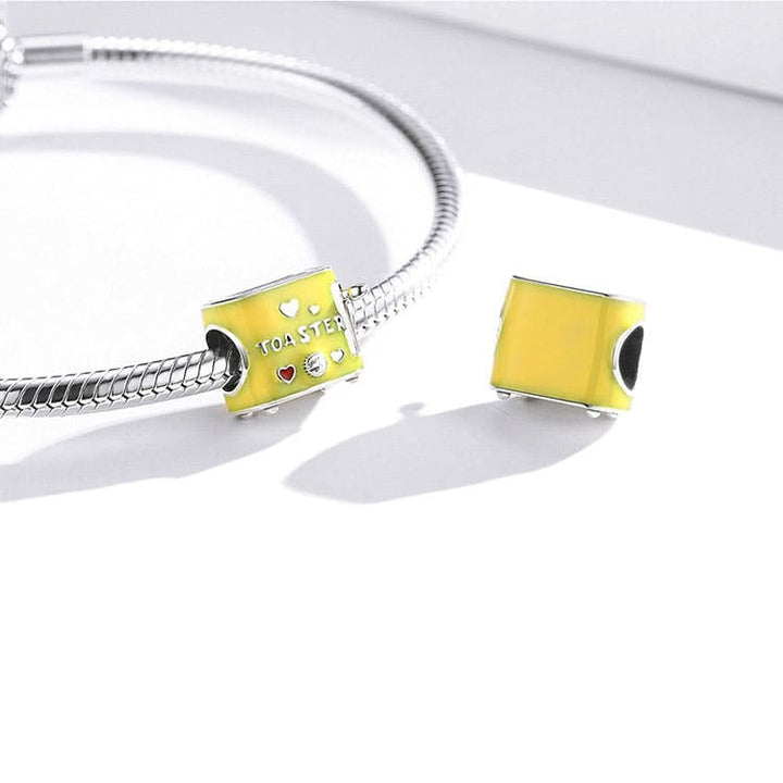 CHARM AMARILLO Y PULSERA DE PLATA