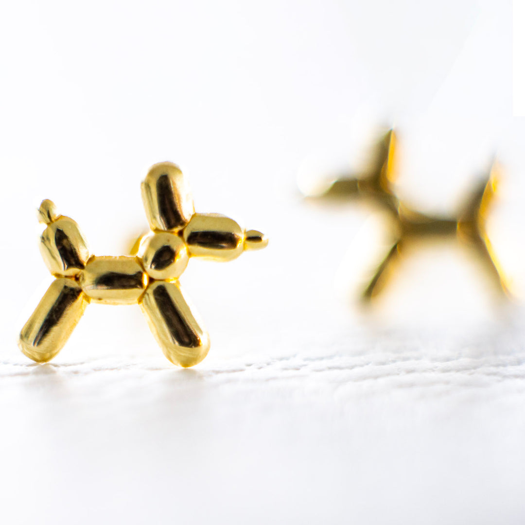 Aretes de oro 18k en forma de perrito de globo