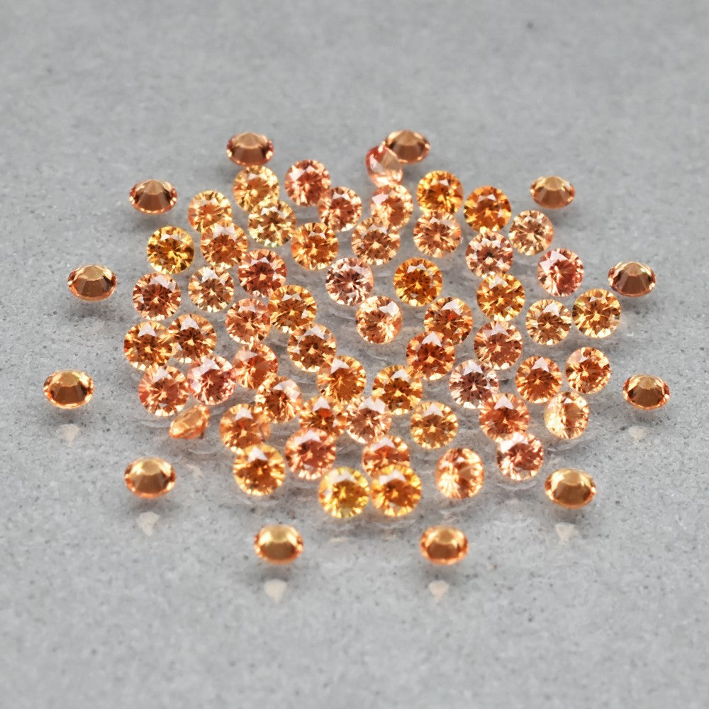 Zafiro amarillento naranja natural 0.68ct corte redonda de Songea, pieza única — Gold Shield
