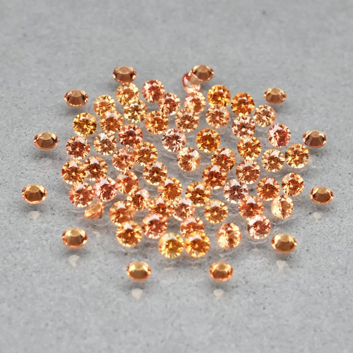 Zafiro amarillento naranja natural 0.68ct corte redonda de Songea, pieza única — Gold Shield