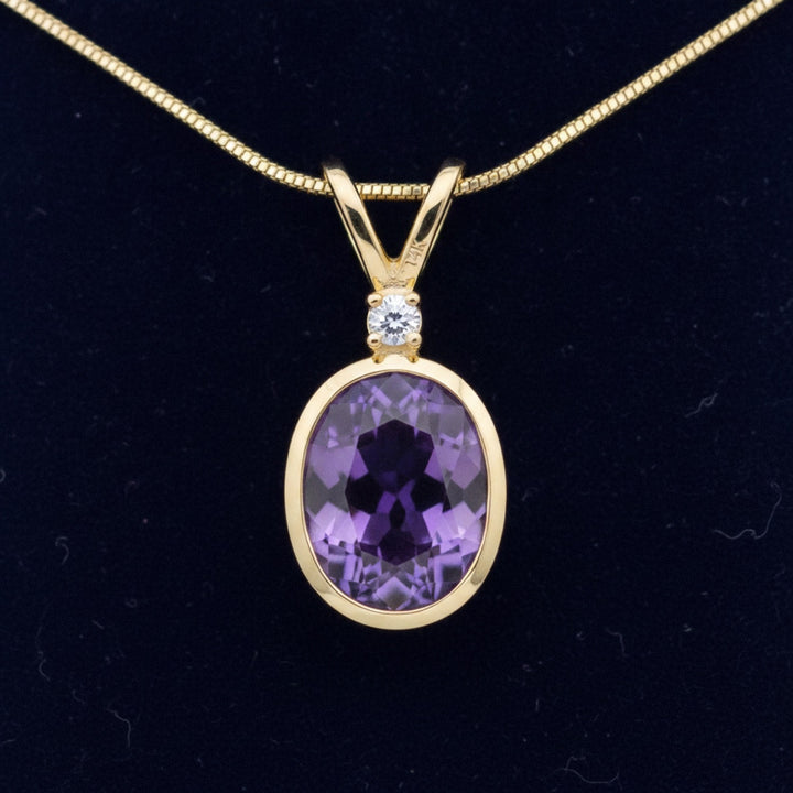 dije oro 14k con amatista purpura natural 3.60ct corte oval, joyería mexicana Gold Shield