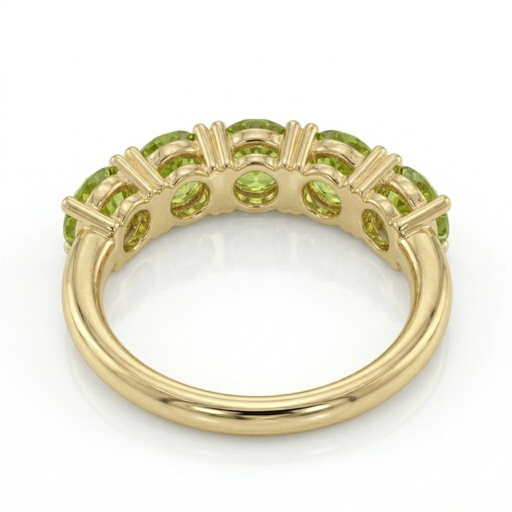 Anillo media eternidad oro 14k con peridotos verdes - lateral - Gold Shield