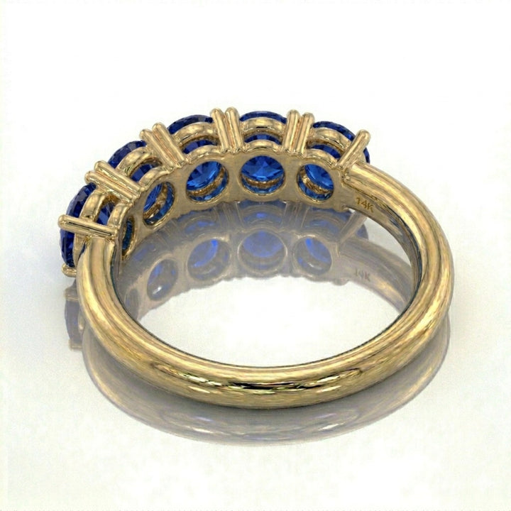 Anillo media eternidad oro 14k con zafiros azules naturales - vista trasera - Gold Shield