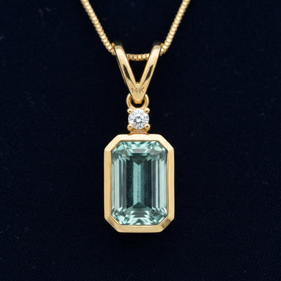 dije de oro 14k con berilo azulado verde natural 0.69ct corte octagon de Africa, joyería mexicana Gold Shield