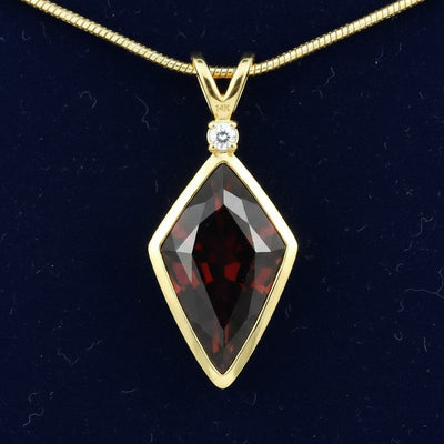 Dije Oro 14k con Granate Spessartita Sin Tratar Nigeria 9.38ct, joyería mexicana Gold Shield