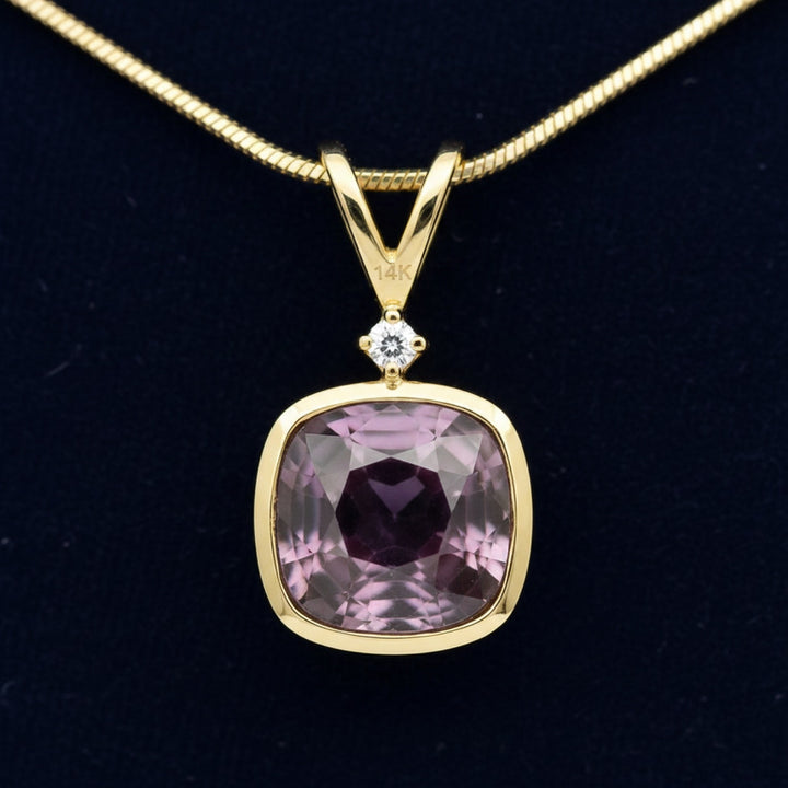 Dije Oro 14k con Espinela Purpura 0.61ct, joyería mexicana Gold Shield - PREVENTA