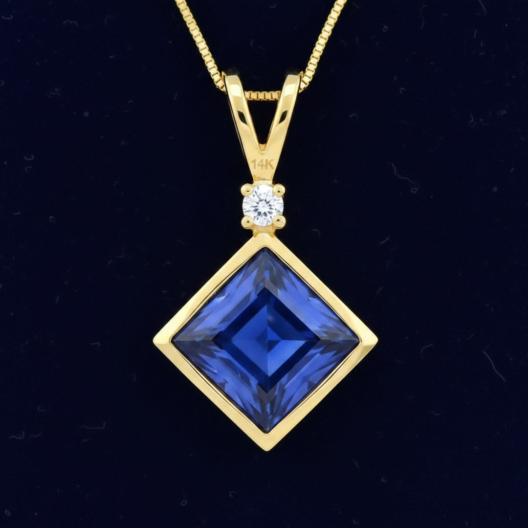 Dije Oro 14k con Zafiro Azul 0.49ct, joyería mexicana Gold Shield - PREVENTA