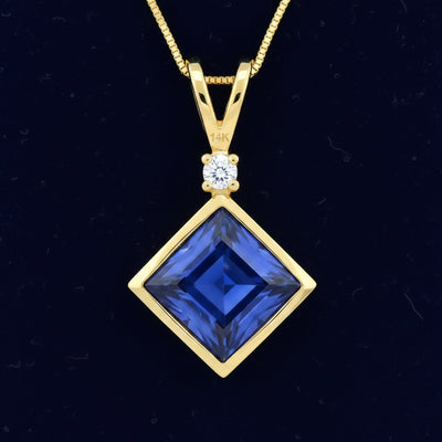 Dije Oro 14k con Zafiro Azul 0.49ct, joyería mexicana Gold Shield - PREVENTA