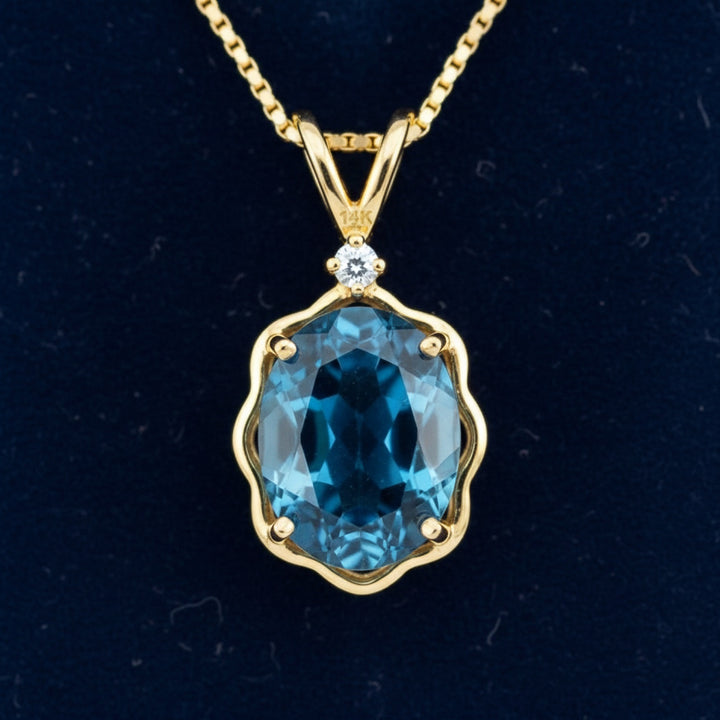 Dije Oro 14k con Topacio Azul London Blue 2.05ct, joyería mexicana Gold Shield - PREVENTA