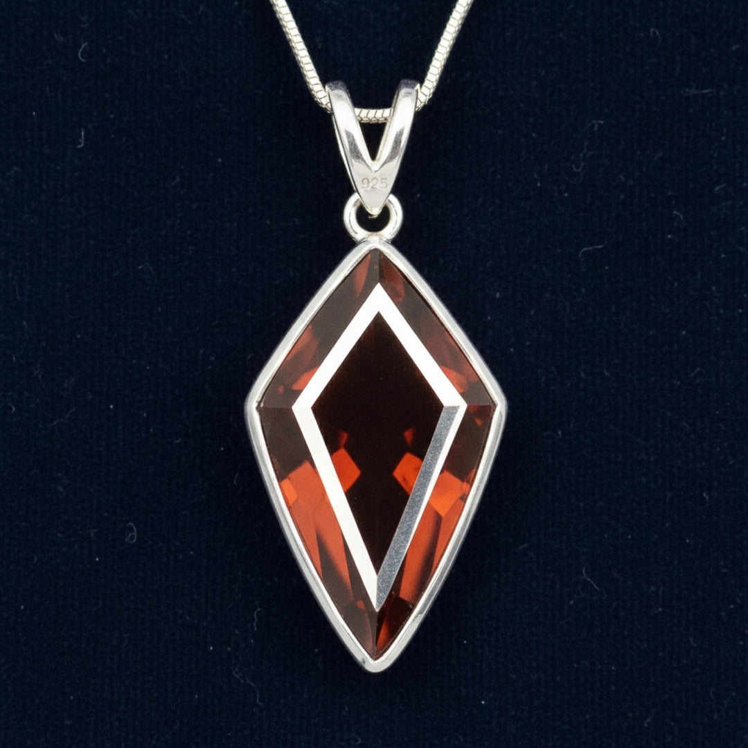 Dije Plata 925 con Granate Spessartita Sin Tratar Nigeria 9.38ct, joyería mexicana Gold Shield