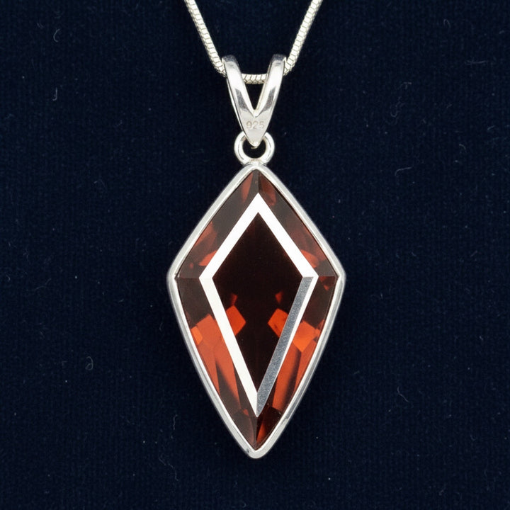 Dije Plata 925 con Granate Spessartita Sin Tratar Nigeria 9.38ct, joyería mexicana Gold Shield