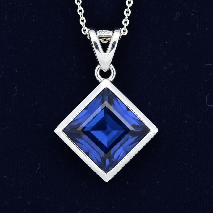 Dije Plata 925 con Zafiro Azul 0.49ct, joyería mexicana Gold Shield - PREVENTA