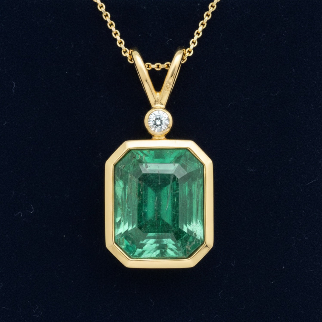 dije oro 14k con esmeralda verde natural 3.13ct corte octagono, joyería mexicana Gold Shield