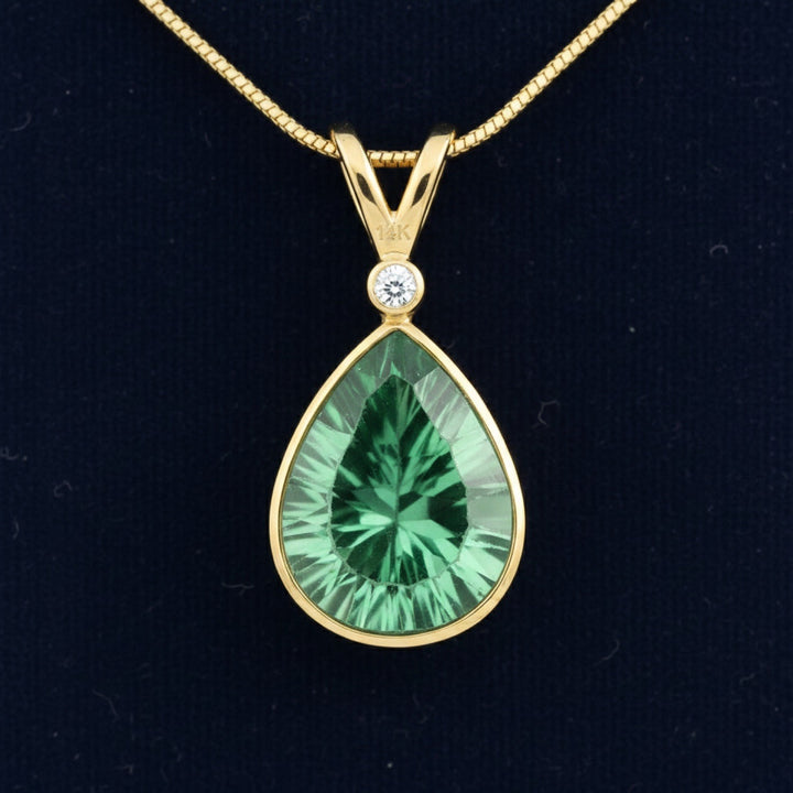 dije de oro 14k con fluorita verde natural 5.70ct corte pera de Sin especificar, joyería mexicana Gold Shield