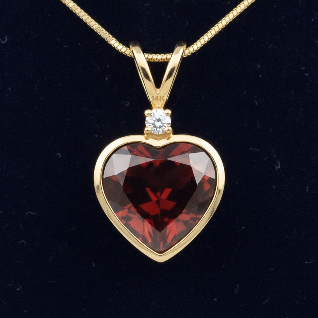 dije oro 14k con granate naranja rojizo natural 3.65ct corte corazon, joyería mexicana Gold Shield