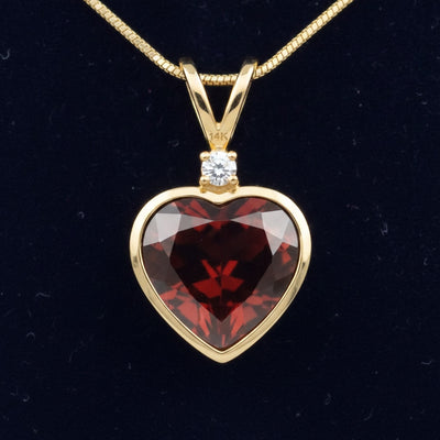 dije oro 14k con granate naranja rojizo natural 3.65ct corte corazon, joyería mexicana Gold Shield
