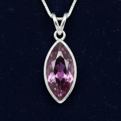 dije de plata 925 con granate rhodolita purpureo rosa natural 0.88ct corte marquesa de Tanzania, joyería mexicana Gold Shield