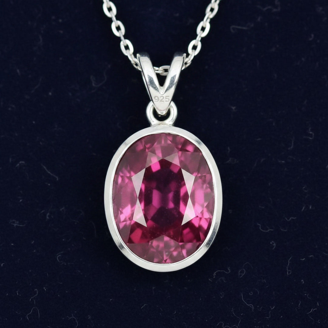 dije de plata 925 con granate rhodolita purpureo rosa natural 2.17ct corte oval de Africa, joyería mexicana Gold Shield