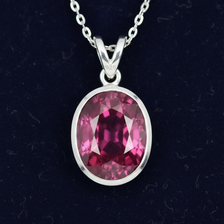dije de plata 925 con granate rhodolita purpureo rosa natural 2.17ct corte oval de Africa, joyería mexicana Gold Shield