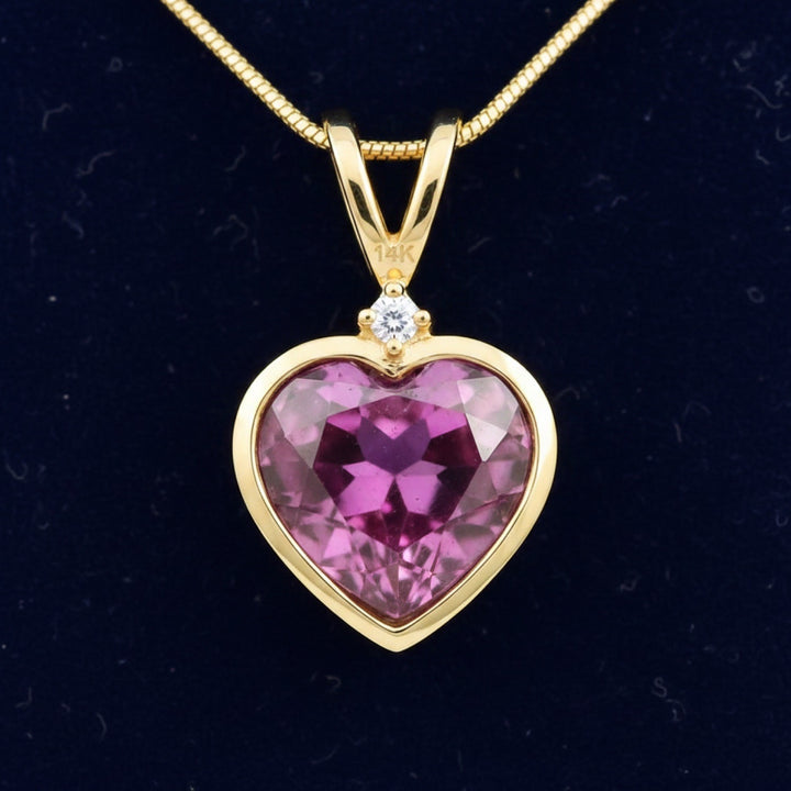 dije oro 14k con granate rhodolita rosa purpura natural 0.92ct corte corazon, joyería mexicana Gold Shield