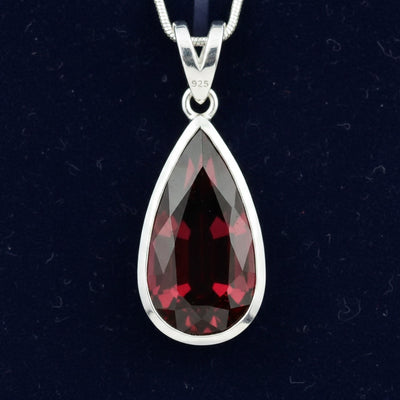 dije de plata 925 con granate rhodolita rosado rojo natural 3.48ct corte pera de Africa, joyería mexicana Gold Shield
