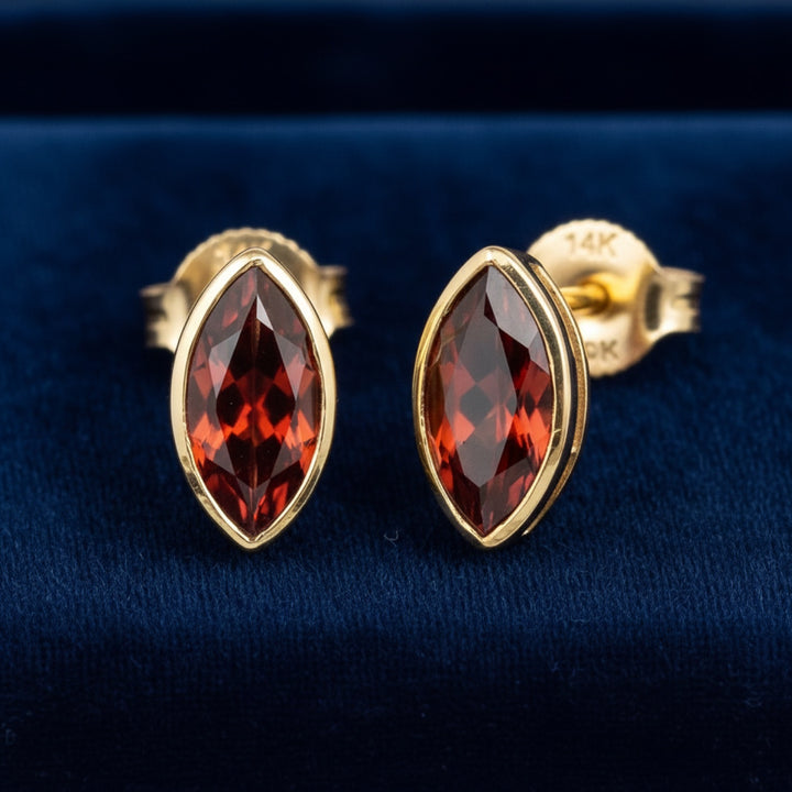 aretes de oro 14k con granate rojizo naranja natural 2.50ct corte marquesa de Madagascar, joyería mexicana Gold Shield