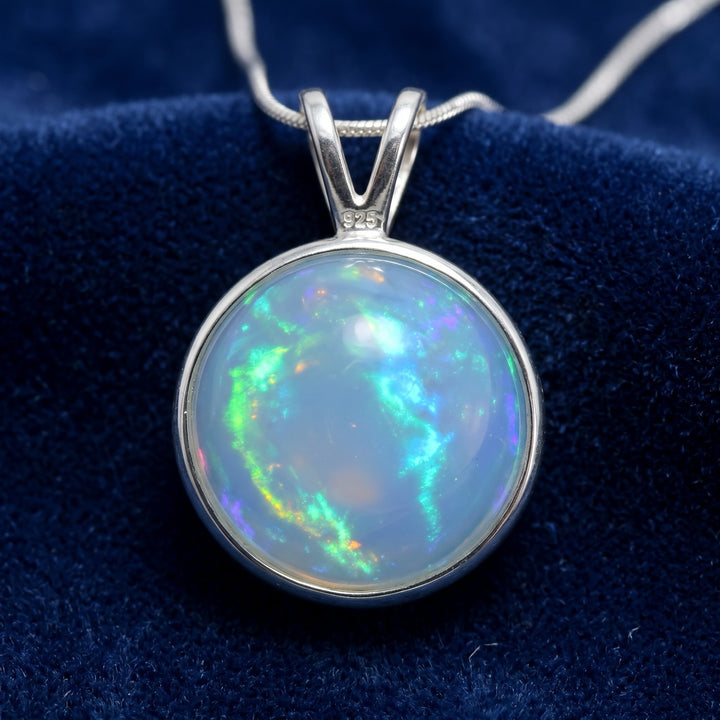 dije plata 925 con ópalo blanco natural 1.66ct corte cabujón redondo, joyería mexicana Gold Shield