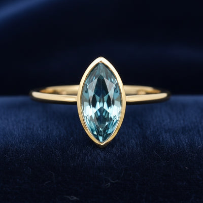 anillo de oro 14k con topacio london blue natural 0.89ct corte marquesa de Brasil, joyería mexicana Gold Shield