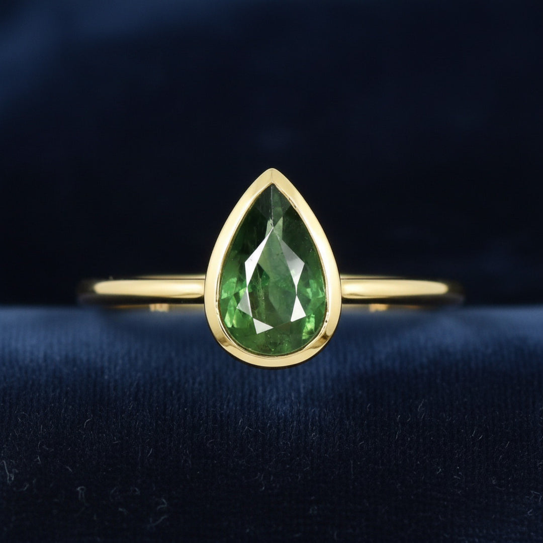 anillo oro 14k con zafiro verde natural 0.89ct corte pera, joyería mexicana Gold Shield