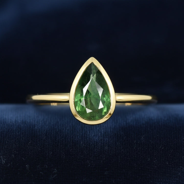 anillo oro 14k con zafiro verde natural 0.89ct corte pera, joyería mexicana Gold Shield