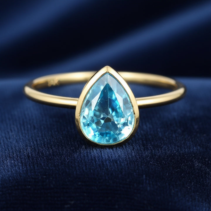 anillo de oro 14k con zircon azul natural 1.43ct corte pera de Camboya, joyería mexicana Gold Shield