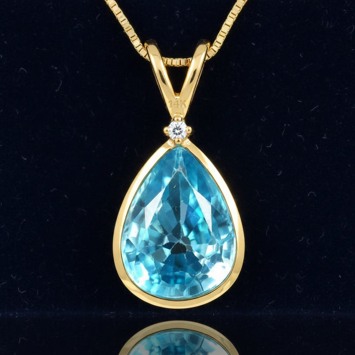 dije de oro 14k con zircon azul natural 1.43ct corte pera de Camboya, joyería mexicana Gold Shield