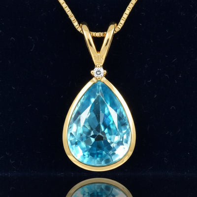 dije de oro 14k con zircon azul natural 1.43ct corte pera de Camboya, joyería mexicana Gold Shield