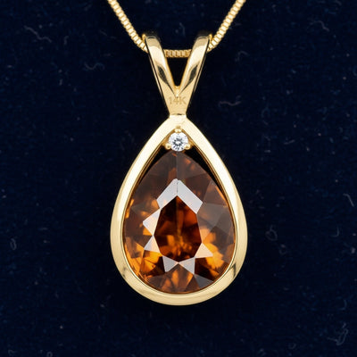 dije de oro 14k con zircon naranja natural 2.21ct corte pera de Tanzania, joyería mexicana Gold Shield
