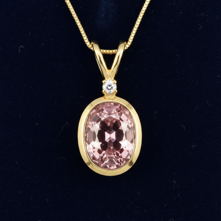 dije de oro 14k con zircon rosa natural 1.41ct corte oval de Tanzania, joyería mexicana Gold Shield