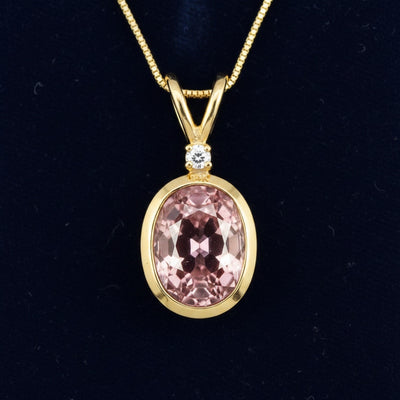 dije de oro 14k con zircon rosa natural 1.41ct corte oval de Tanzania, joyería mexicana Gold Shield