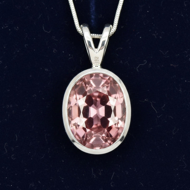 dije de plata 925 con zircon rosa natural 1.41ct corte oval de Tanzania, joyería mexicana Gold Shield
